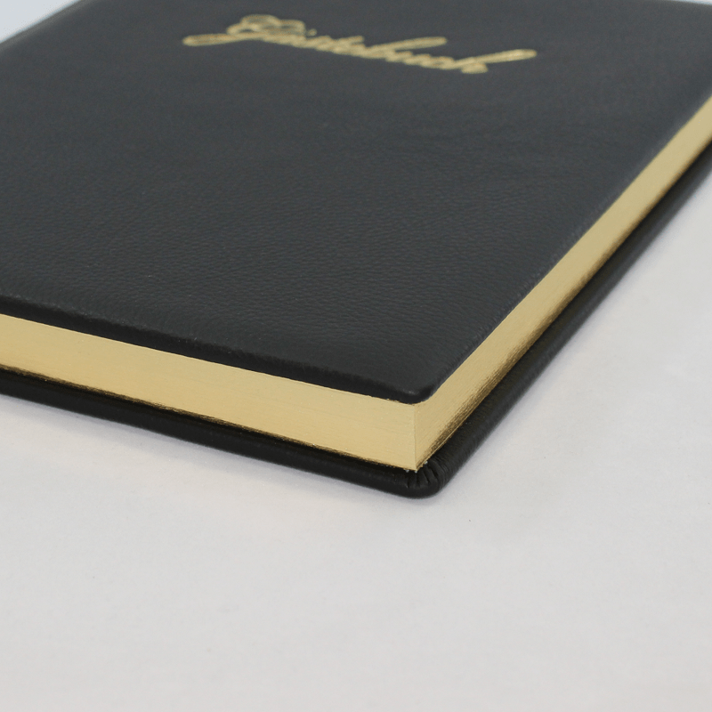 Ledereinband mit Goldschnittblock Gästebuch Hotel