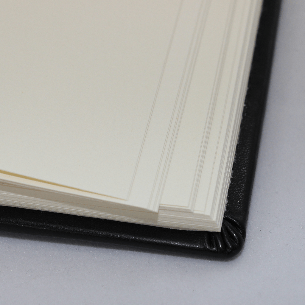 Gästebuch Memory Kunstleder schwarz mit Lesebändern Gästebuch Memory schwarz handgerissener Büttenrand