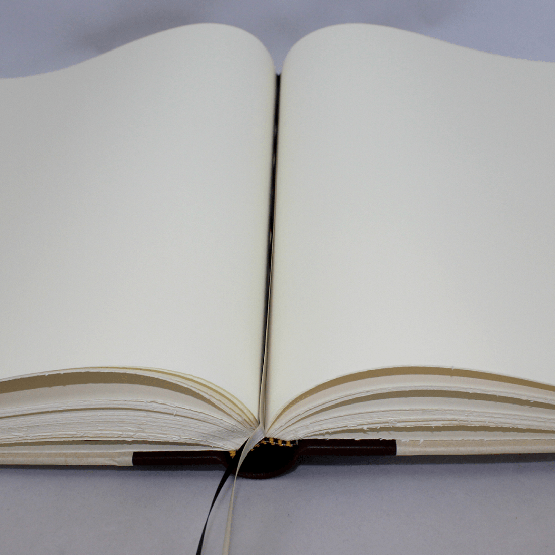 Gästebuch Elefantenhaut runde offen Gästebuch Halbleder mit Elefantenhaut