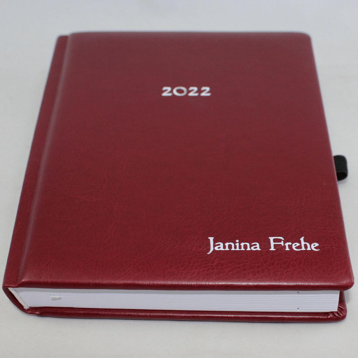Taschenkalender A5 mit Namensprägung handgebunden Taschenkalender DIN A5 mit Namensprägung Kunstleder in Weinrot